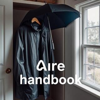 Rain gear airing in a shaded wardrobe corner