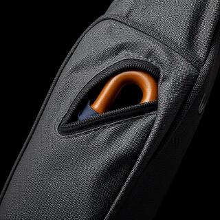 Crossbody bag with quick-access umbrella sleeve