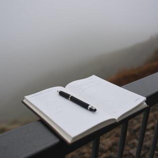 Hill station path in mist