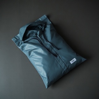 Packable raincoat in a small pouch