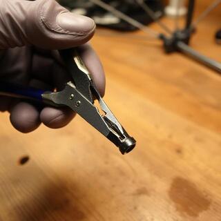 Technician replacing an umbrella rib tip