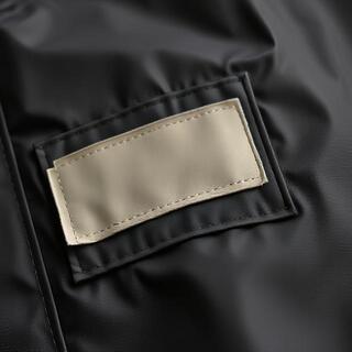 Close-up of a patched seam under light