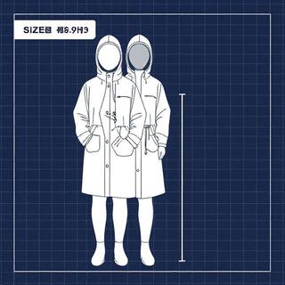 Raincoat on hanger indicating mid-thigh length