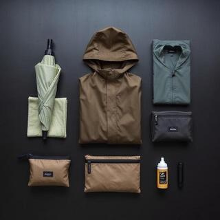 Flat lay of monsoon daypack items