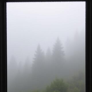 Hill-station fog on a window