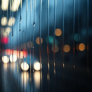 Metro rains seen through a window pane